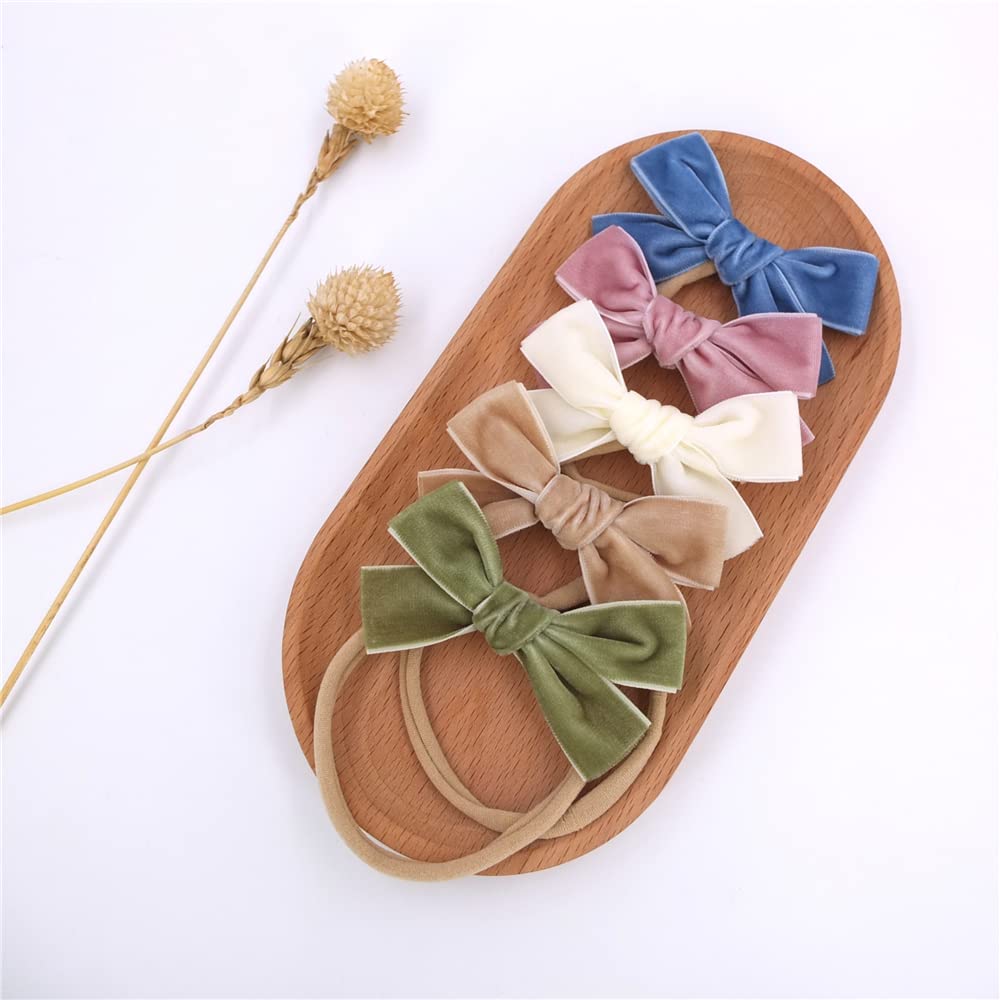 Sugarmelon handmade velvet bow close-up emphasizes durable, gentle fabric ideal for baby photos.