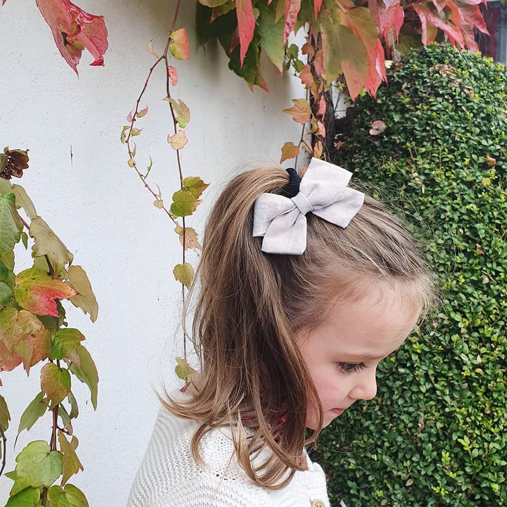 Sugarmelon linen bow clip keeps bangs out of face