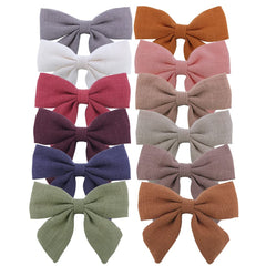 Sugarmelon linen bow hairclip with assorted styles coordinates baby outfits