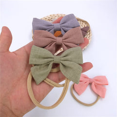 Sugarmelon linen bow headband for birthday parties and outfits.