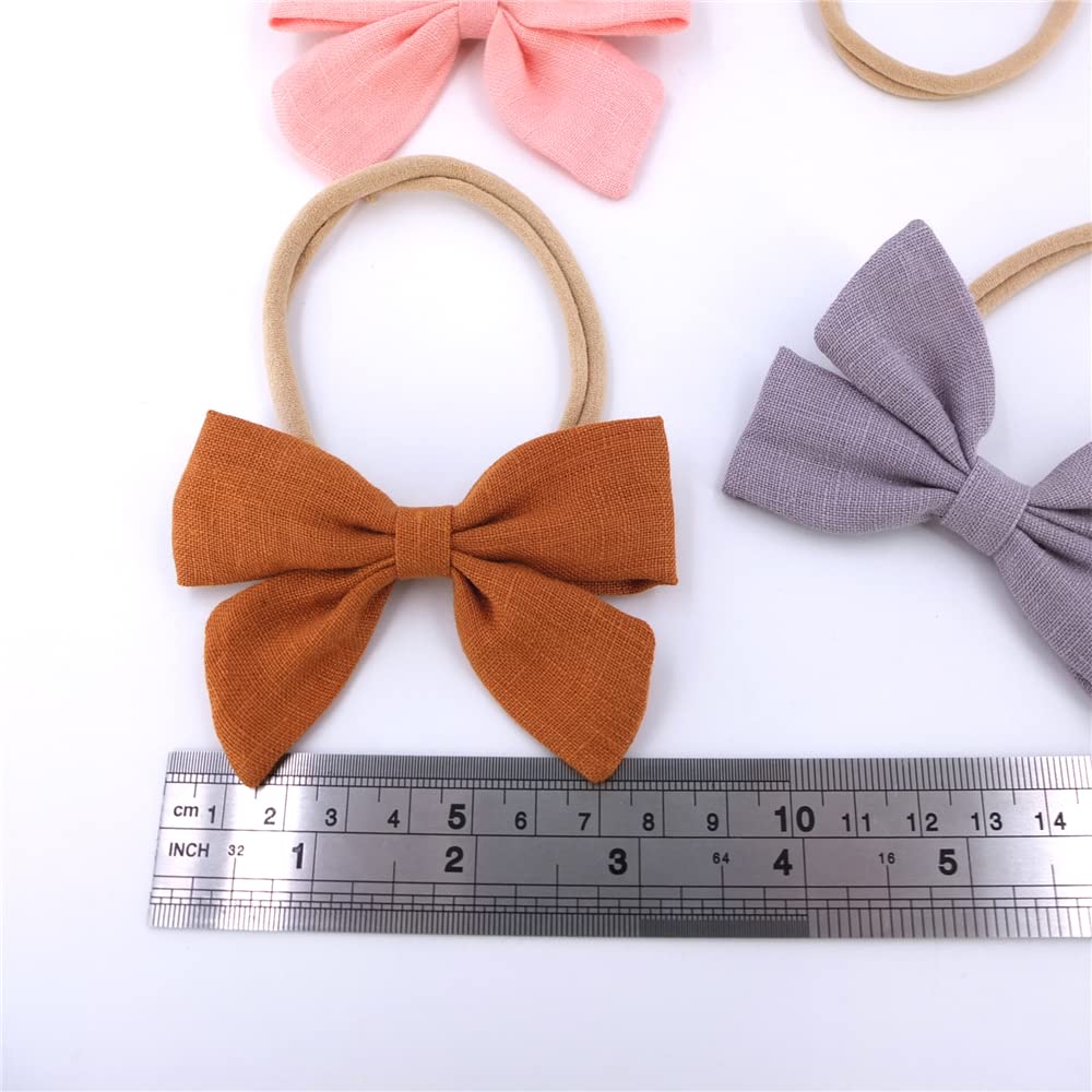 Sugarmelon linen bow headband used as a family photo prop.