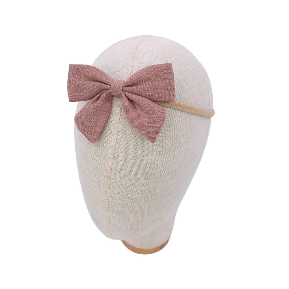 Sugarmelon linen bow headband made from skin-friendly fabric for delicate scalps.