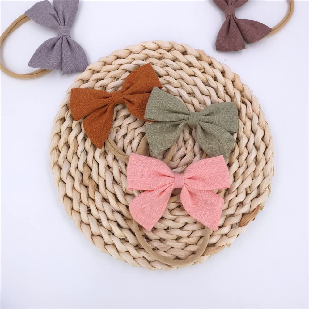 Sugarmelon linen bow headband with soft stretch preventing slips.