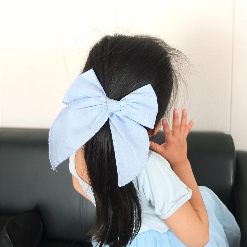 Sugarmelon linen-cotton-velvet fabric closeup blue-sky bow, emphasizing soft durable material.