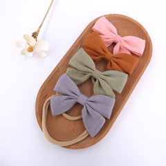 Sugarmelon linen sailor bow headband 3-2-inch fits growing baby.