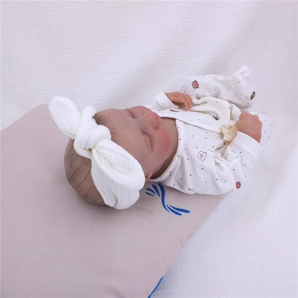 Sugarmelon Original headband newborn-on-baby demonstrates soft muslin comfort.