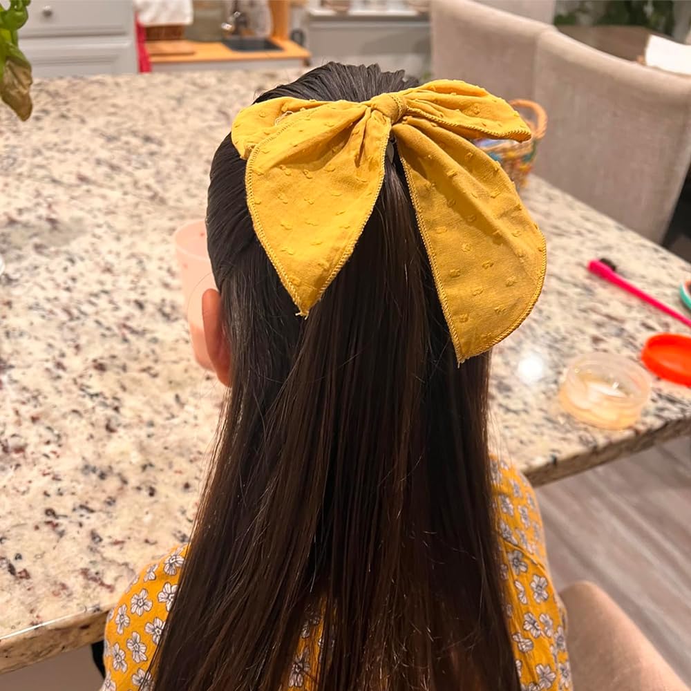 Sugarmelon Fable Bow worn by smiling girl; adds charming everyday flair