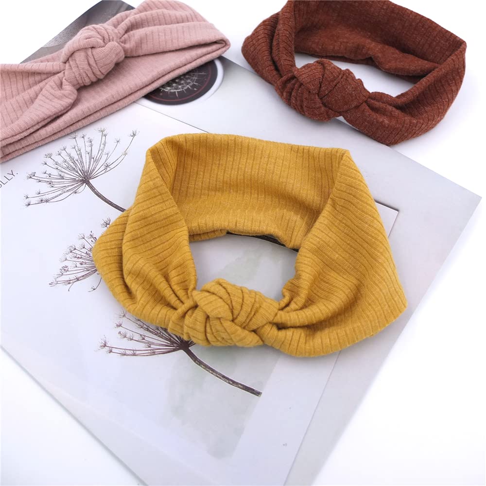 Sugarmelon photography-ready headband on baby, perfect for family portraits.