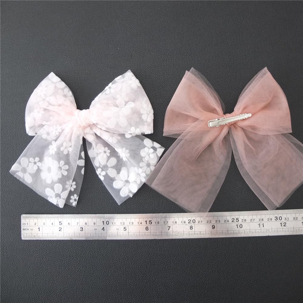 Sugarmelon pink floral bow on mom's hair for coordinated style.