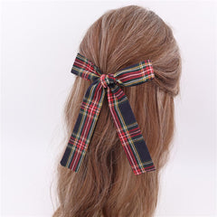 Sugarmelon tartan bow 5in fable showcases playful elegance for school days.
