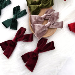 Sugarmelon velvet bow hair clip close-up texture highlights soft velvet and gentle grip.