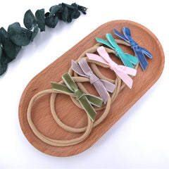 Sugarmelon velvet bow headband with assorted colors pairs easily with outfits for photos.