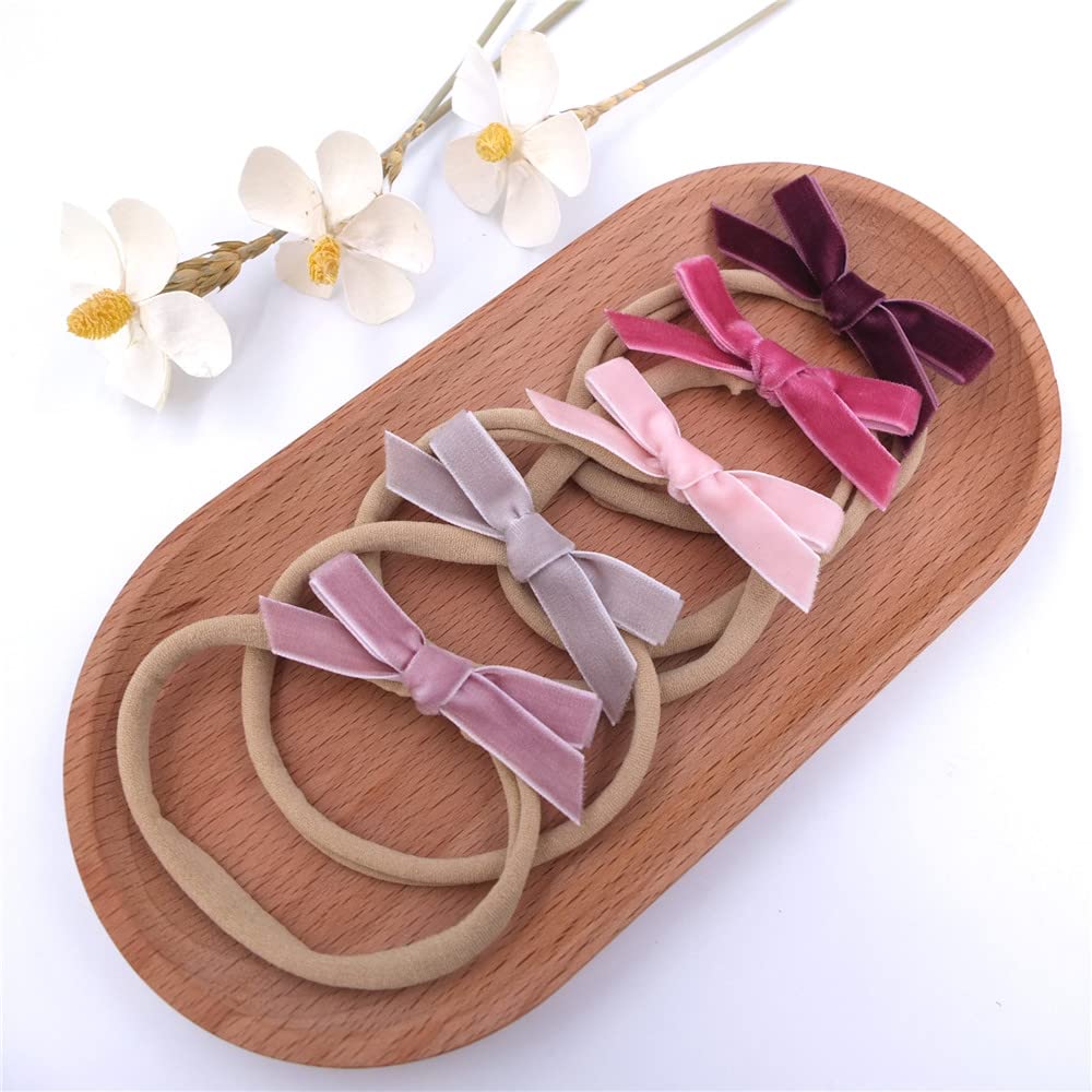 Sugarmelon slip-free headband on toddlers during outdoor play.