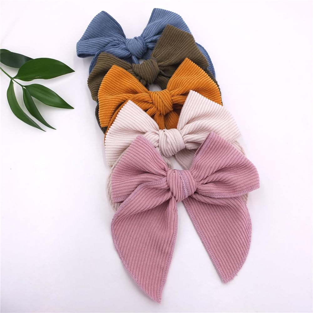 Sugarmelon corduroy velvet bow clipped for baby show or party look.