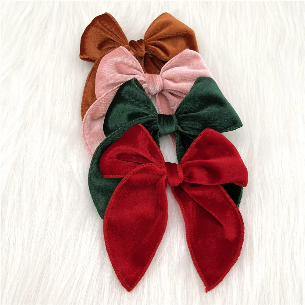 Sugarmelon Velvet Fable Bow clip in mint pairs with spring looks and soft textures.