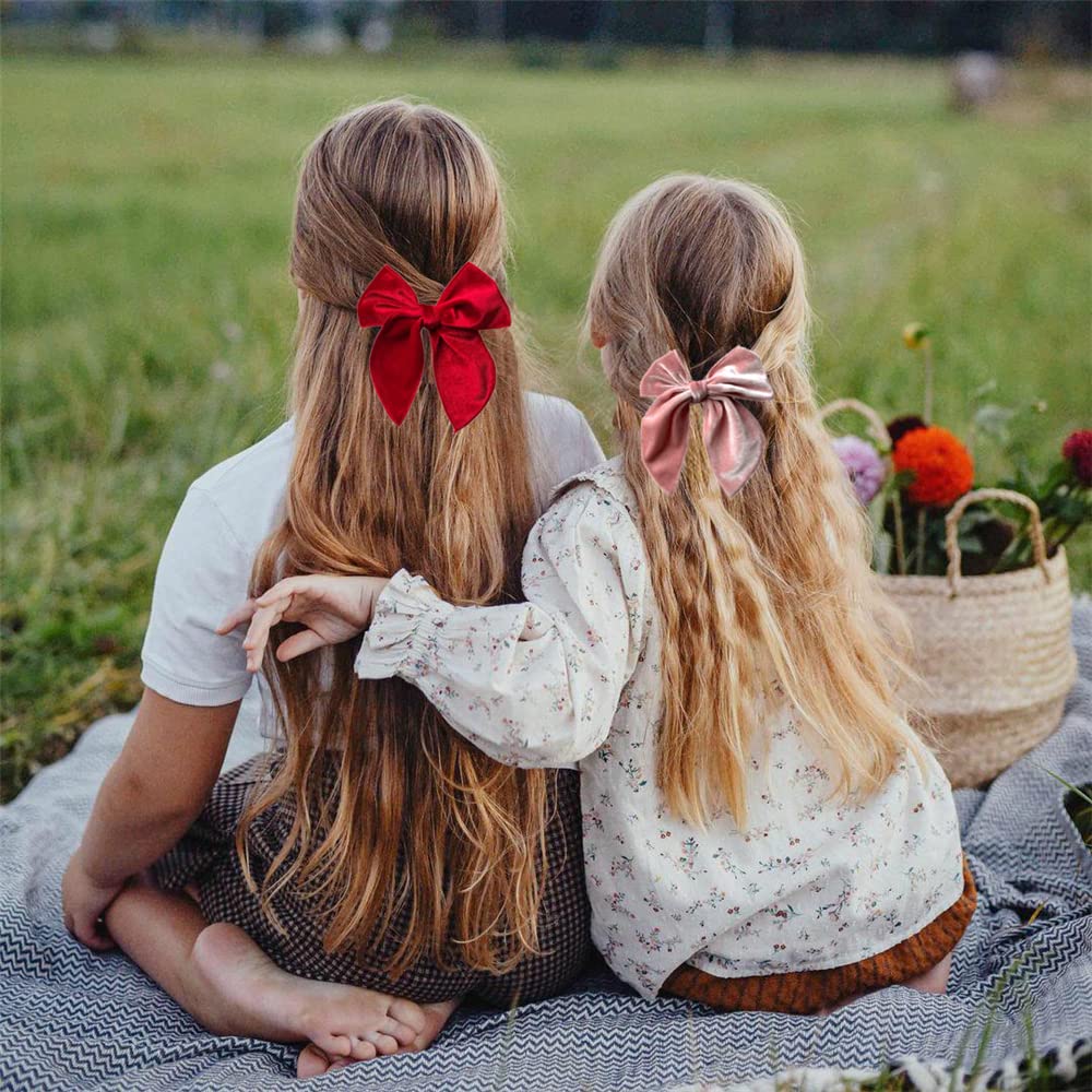Sugarmelon Velvet Fable Bow clip in navy demonstrates bold color and easy secure grip.