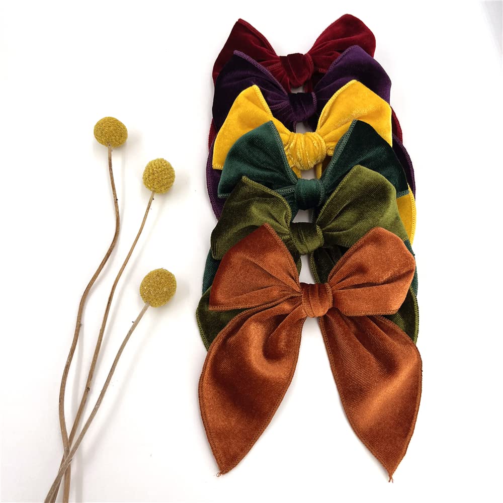 Sugarmelon Velvet Fable Bow clip in sky blue complements everyday outfits and photos.