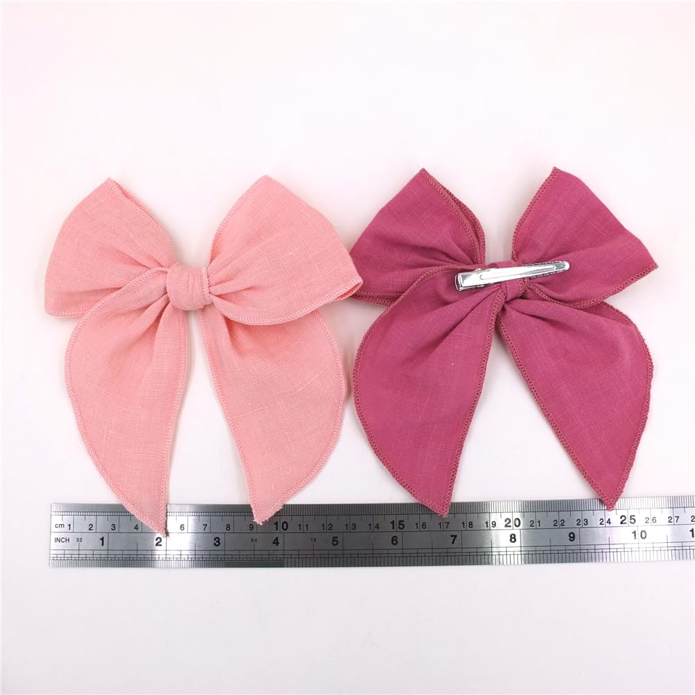 Sugarmelon versatile pack of four bows demonstrates coordinated pink-rose styling.