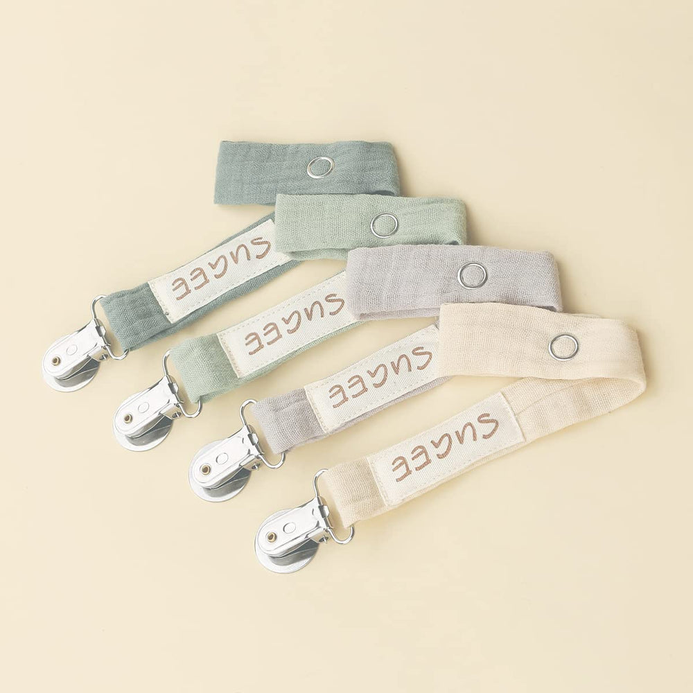 Sugee baby pacifier clip beige close-up showing soft fabric for comfy wear.