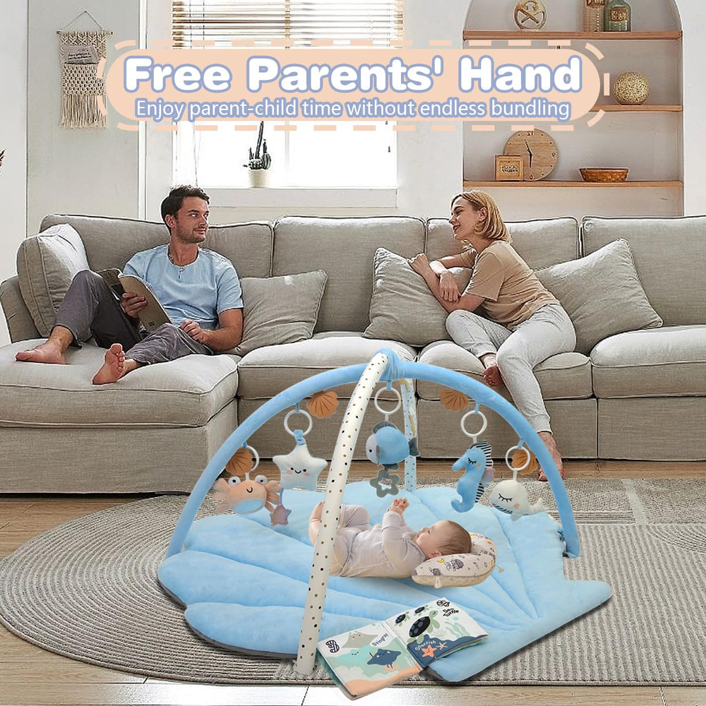 suihuooo shell toys hang from the mat promoting visual and tactile sensory engagement during play