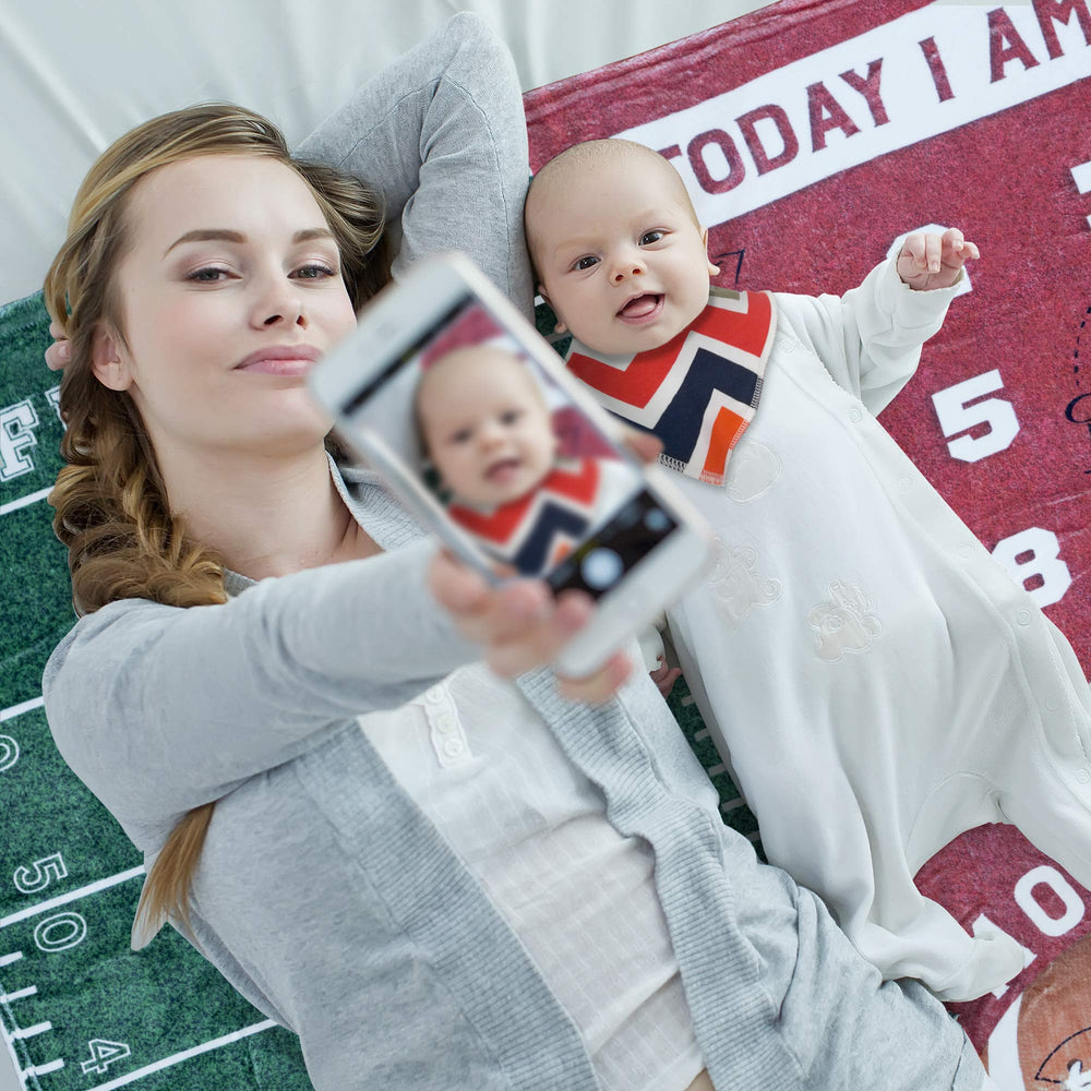 SUKOON football milestone blanket fabric close-up demonstrates plush, baby-friendly softness.