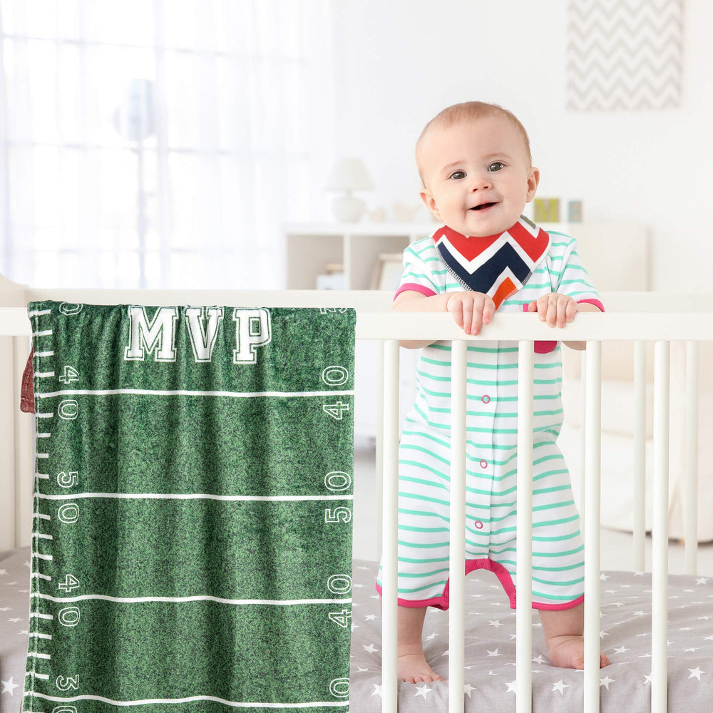 SUKOON large 47x40 inch blanket spread on crib for newborn photos.