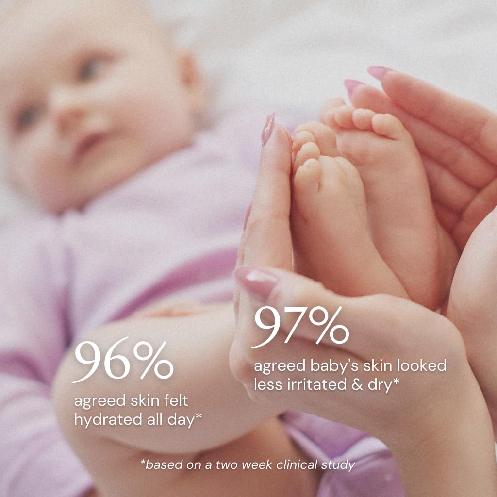 Sunborn Organics Baby Balm applied to baby's cheek for soothing moisture.
