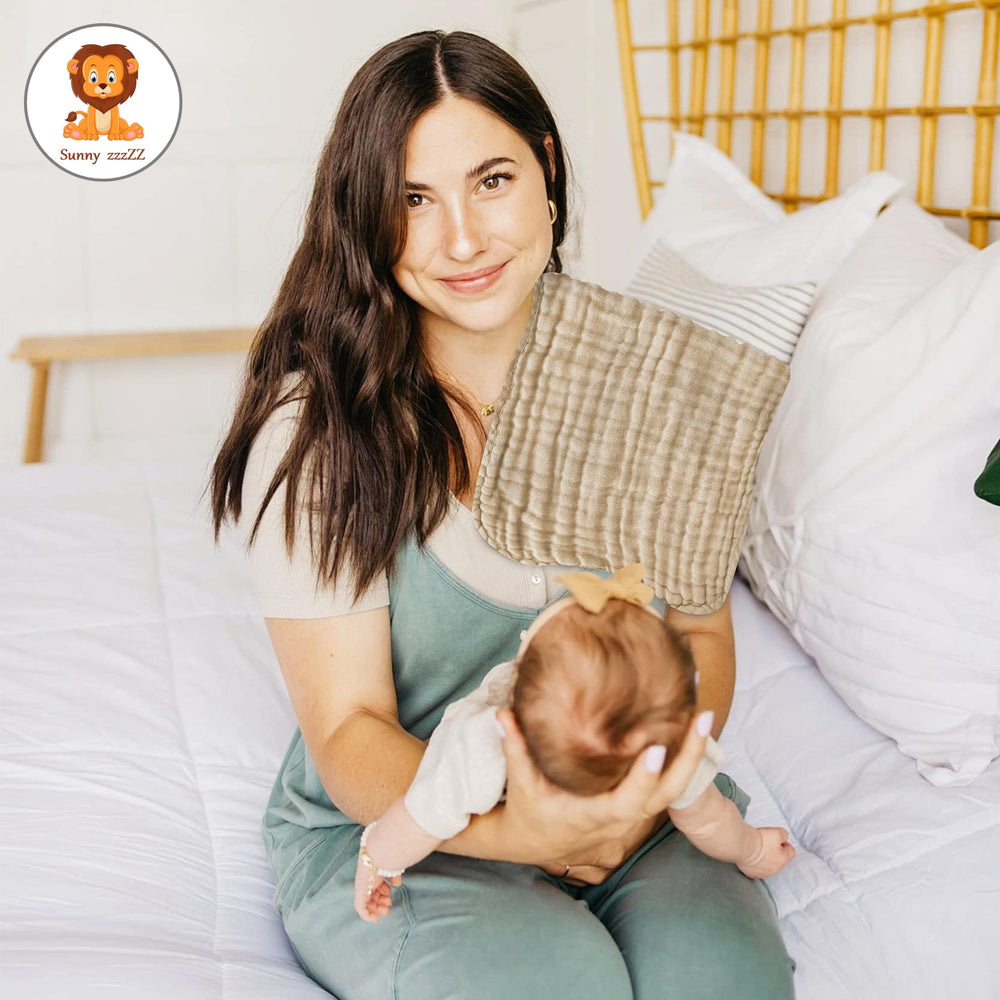 Sunny zzzZZ burp cloths folded for quick grab-and-go accessibility.