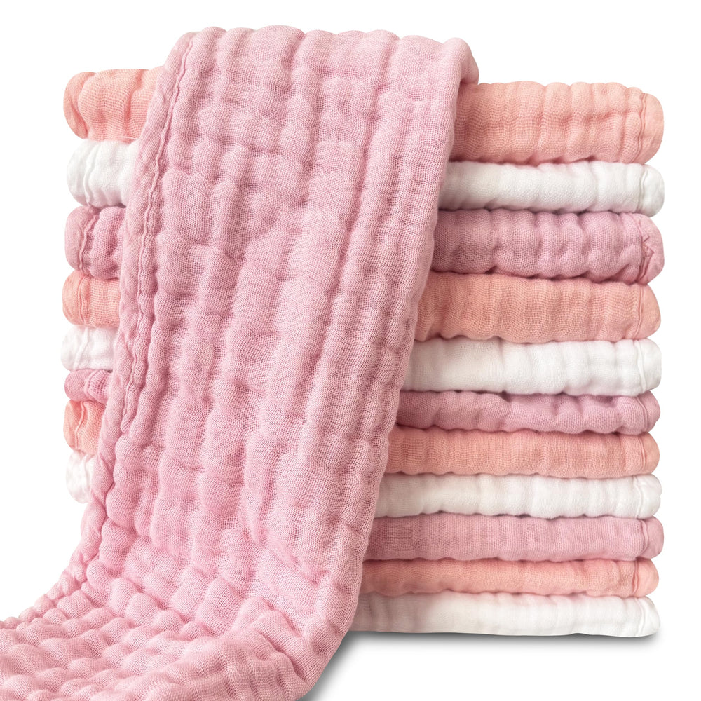Sunny zzzZZ muslin burp cloths folded near baby, soft touch for skin protection.