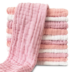 Sunny zzzZZ muslin burp cloths folded near baby, soft touch for skin protection.
