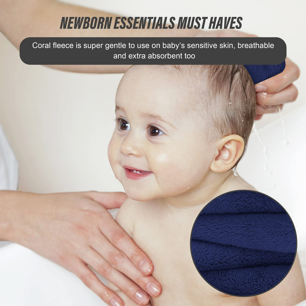 Sunny zzzZZ navy blue washcloths stacked in a bathroom setting