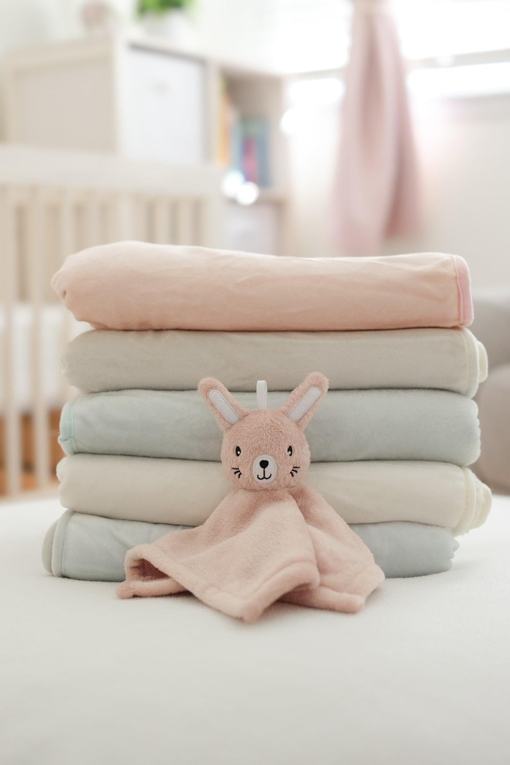 SUNSHINE & SNUGGLES Lovey pink bunny bedtime scene emphasizes soothing security for routines.