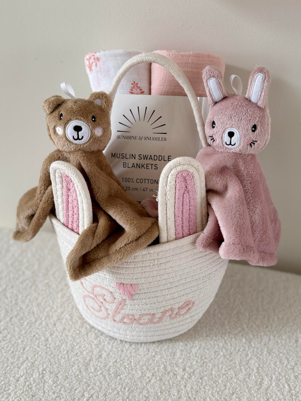 SUNSHINE & SNUGGLES Lovey pink bunny soft texture invites cozy snuggles and hugs.