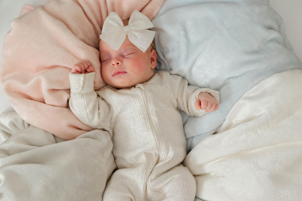 Sunshine & Snuggles blanket cloud blue soft surface ideal for cozy nap times.