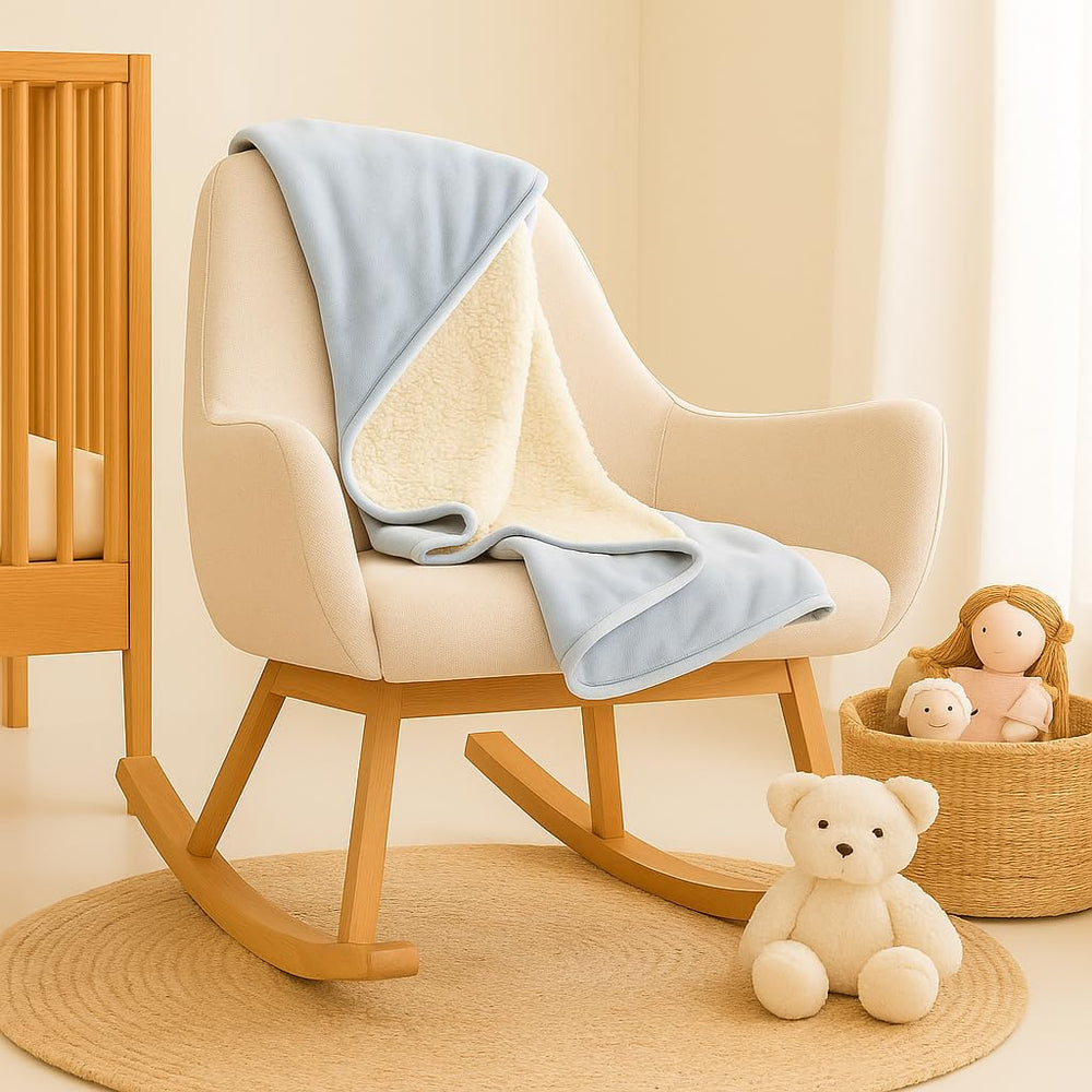 Sunshine & Snuggles cloud blue blanket close-up texture suggests breathable softness.