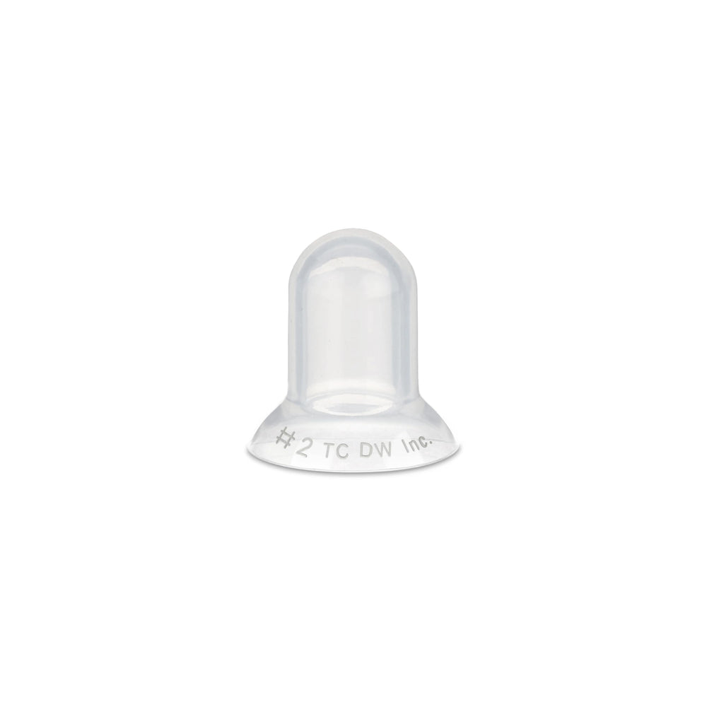 Mom uses Supple Cups during a feeding to support latch.