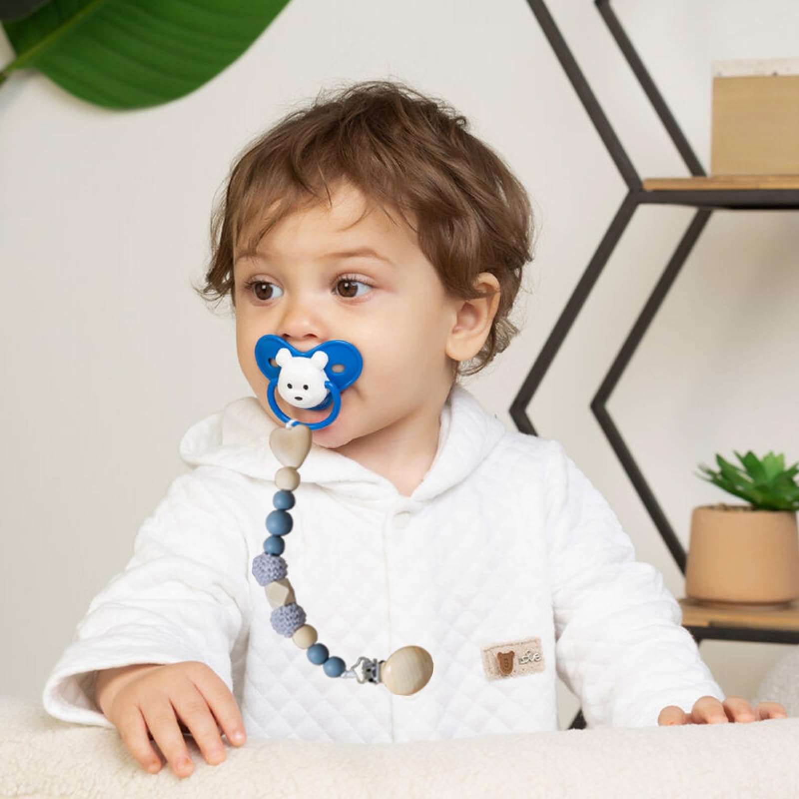 Suptizizkz wood pacifier clips with teether accessory during playtime