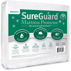 SureGuard crib mattress protector top view showing soft cotton surface protecting against spills and stains.
