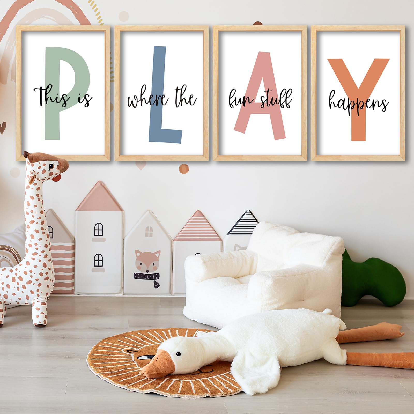 Surfapans nursery signs mounted on wall offer an engaging playroom backdrop.