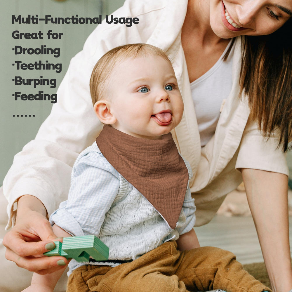 Susurration newborn-to-36-months fit bib complements any outfit.