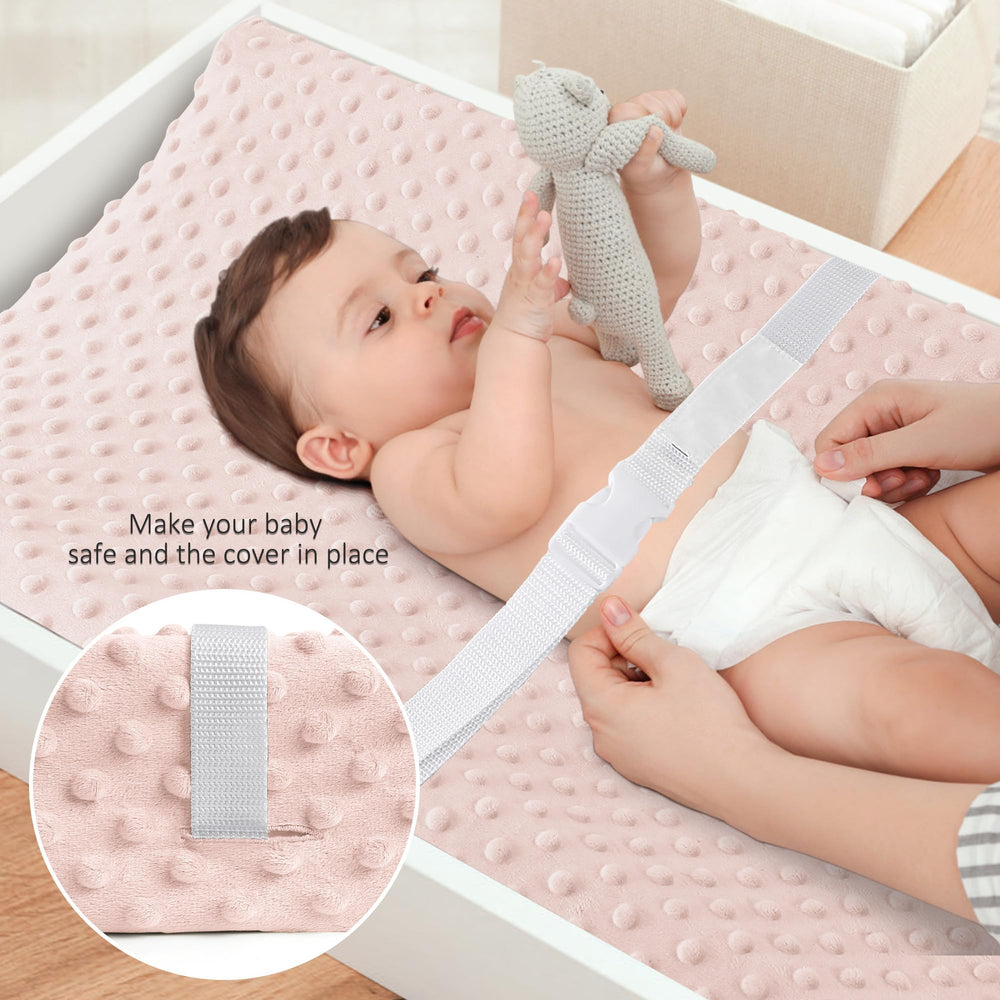 Susurration changing pad cover on standard pad demonstrates universal fit for most changing tables.