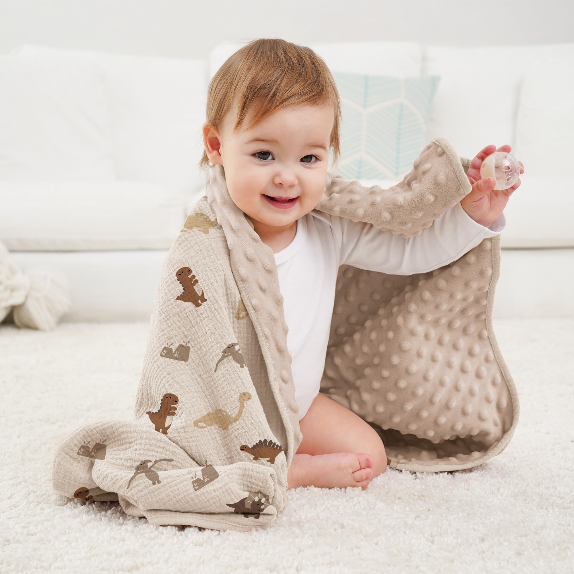 Susurration dinosaur cream back featuring plush dotted fleece for gentle warmth