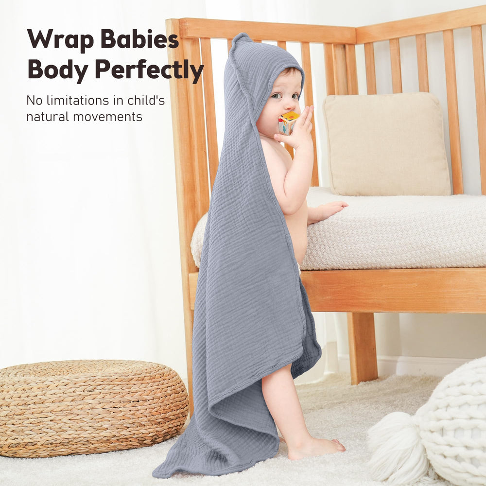 Susurration hooded baby towel drying after bath demonstrates absorbent cotton performance