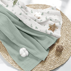Susurration muslin blanket green bamboo color close-up shows breathable cotton