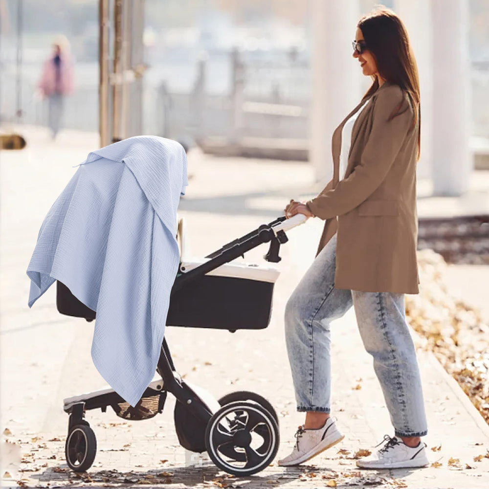 Susurration muslin swaddle navy burp cloth usage demonstrates versatile spill cleanup.