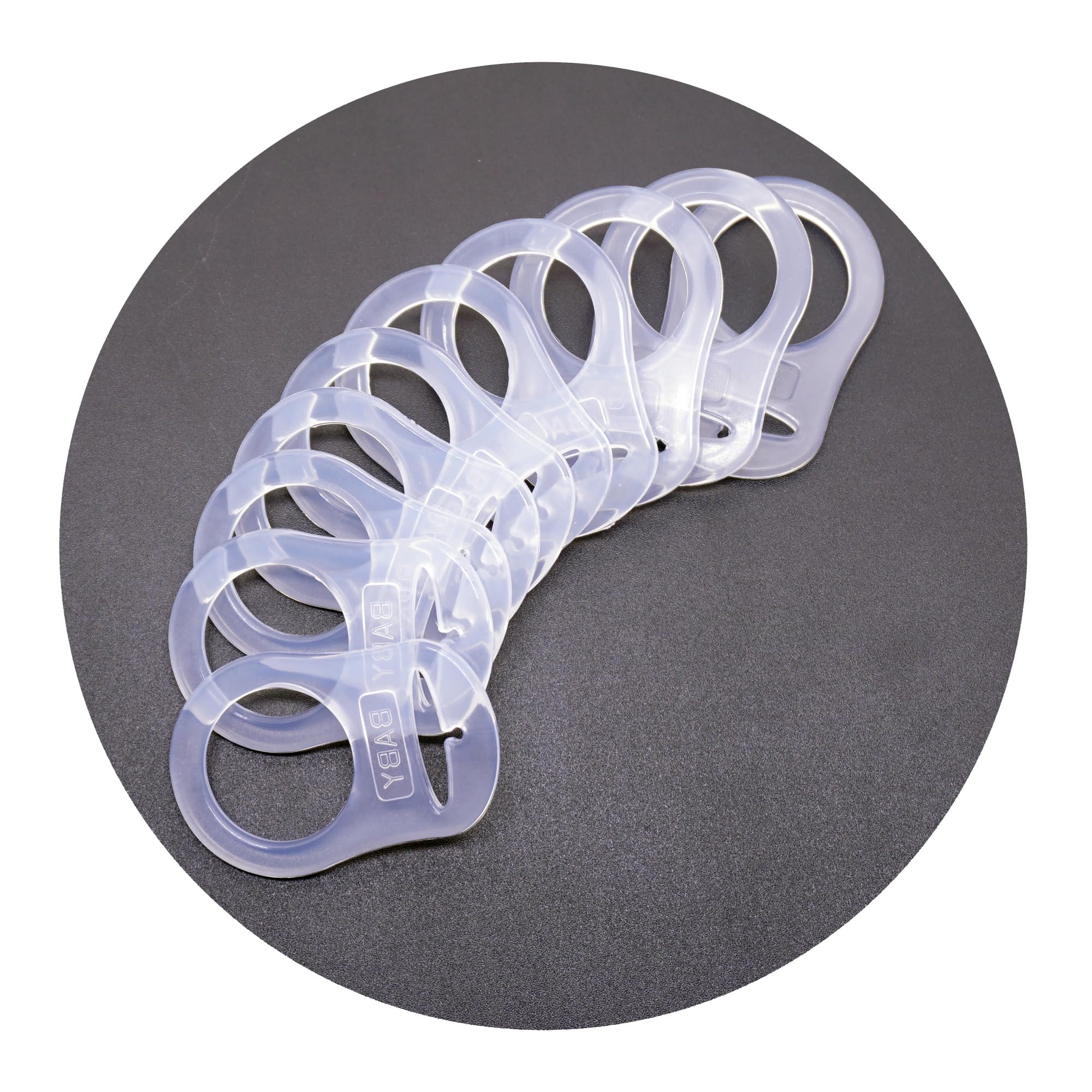 Sutoyuen button-style adapter ring closeup for MAM-compatible pacifiers.