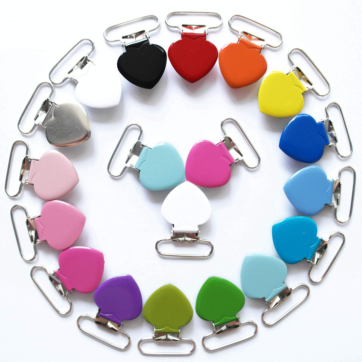 Sutoyuen heart-shaped pacifier clip assembly with enamel finish for durable fabric grip.