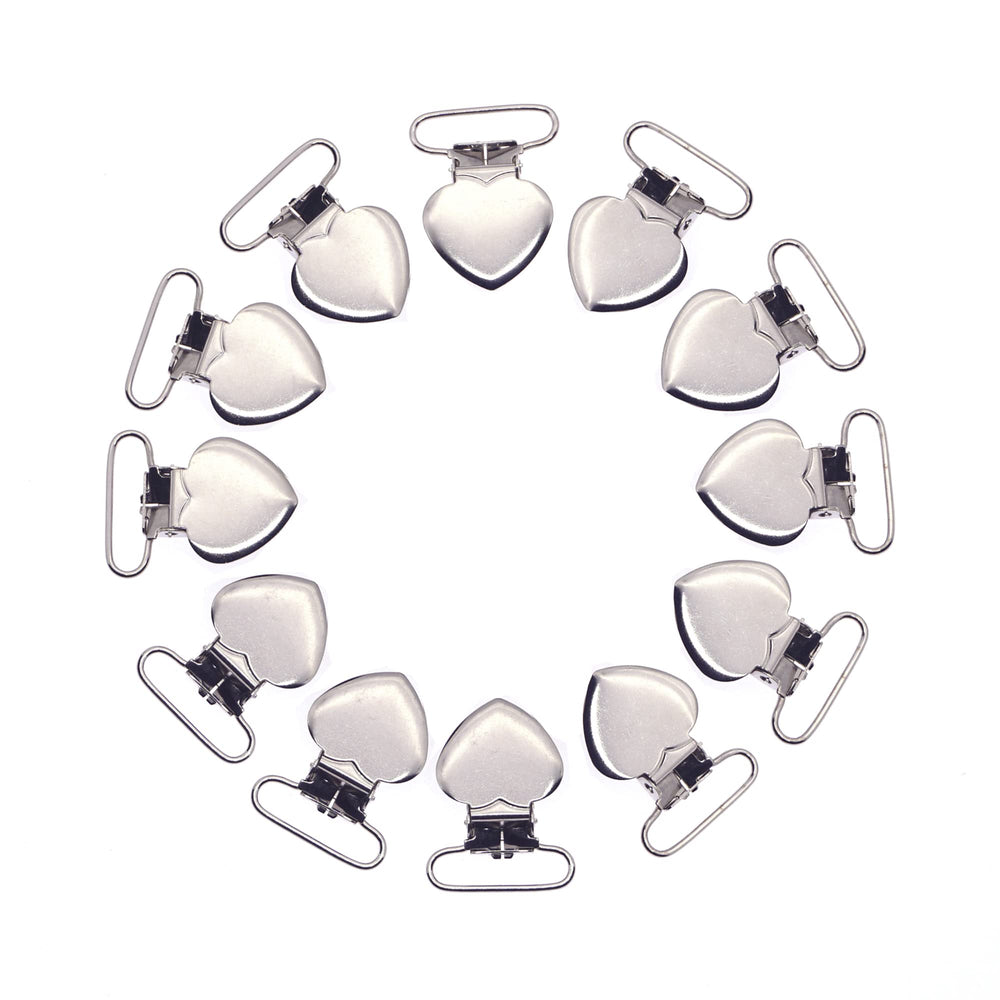 Sutoyuen heart pacifier clip closeup with plastic teeth protecting fabric