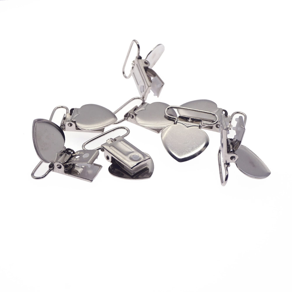 Sutoyuen silver heart clip closeup highlighting lead-free safety