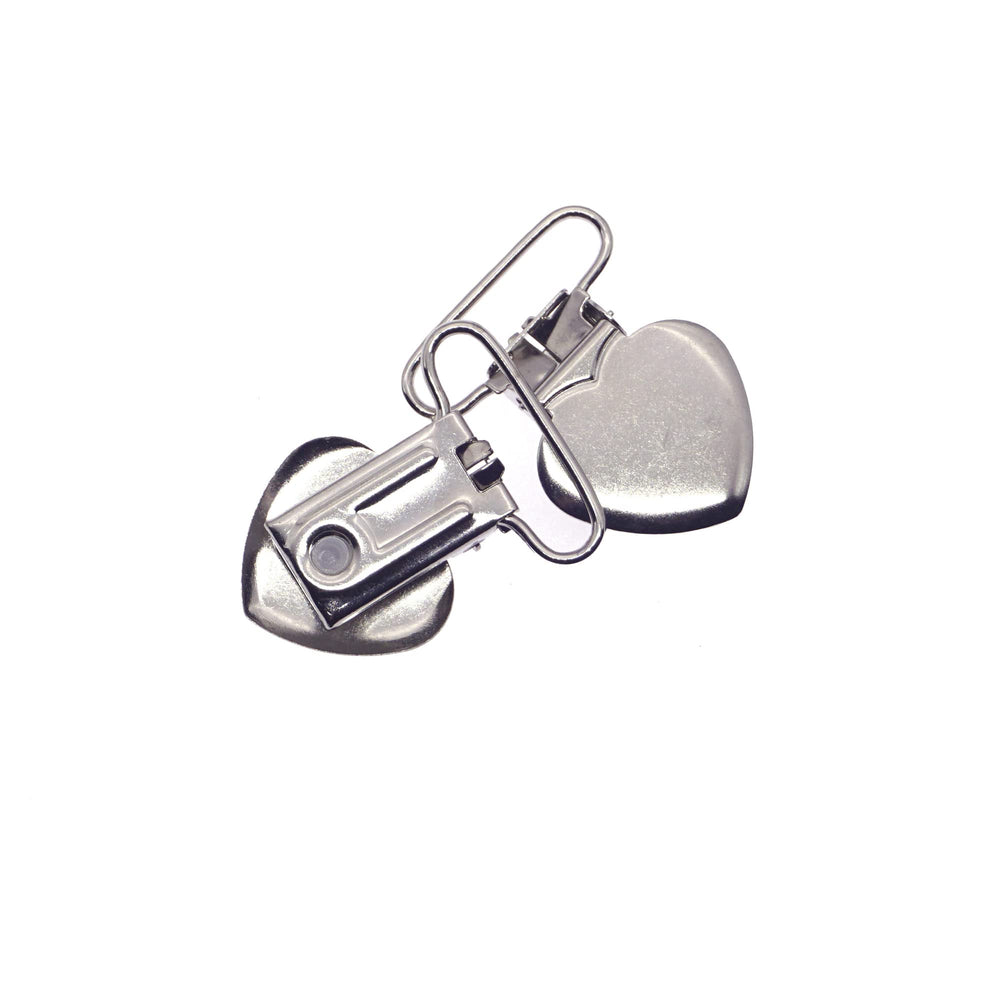 Sutoyuen pacifier clip in use on bib holders closeup